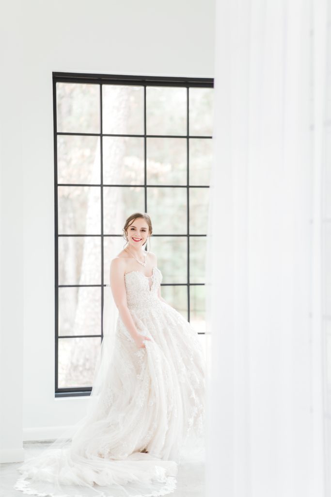 bride twirling in her dress, the oak atelier, springs event venues, springs woodlands weddings, houston wedding photographer